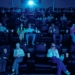 Cinema audience wearing 3D glasses; illustrative stock photograph